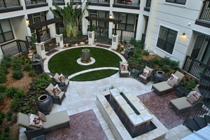 Courtyard area right outside our apartment includes seating and gas grills!