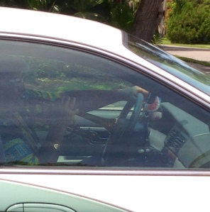 Weirdo playing the trumpet while driving.  That was new.